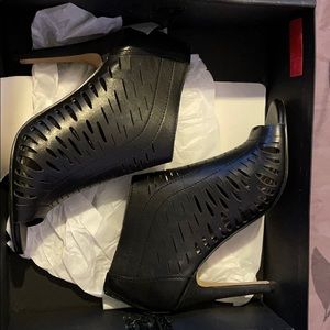 Nice tall Black heeled ankle boot